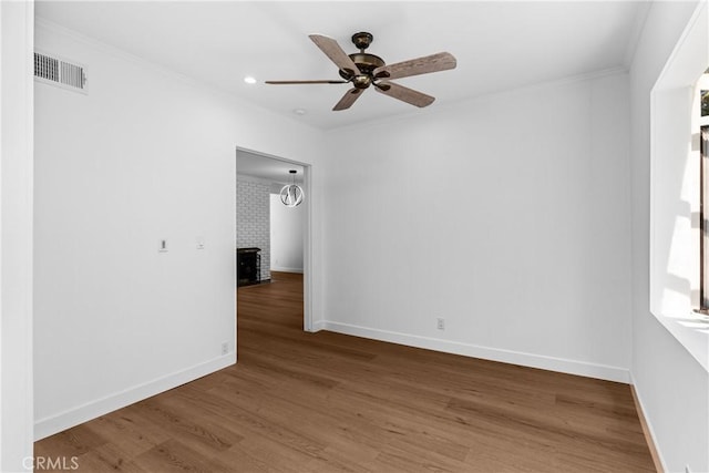2610 Via Pacheco, Palos Verdes Estates, CA 90274 - spare room featuring ceiling fan, ornamental molding, wood finished floors, and recessed lighting