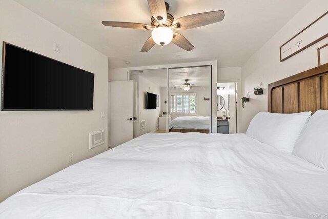 13323 Rancho Penasquitos Blvd Unit D206, San Diego, CA 92129 - bedroom featuring a ceiling fan