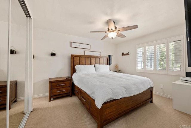 13323 Rancho Penasquitos Blvd Unit D206, San Diego, CA 92129 - bedroom with light carpet and ceiling fan