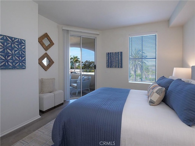 1281 Cabrillo Ave Unit 303, Torrance, CA 90501 - bedroom with access to outside and wood finished floors