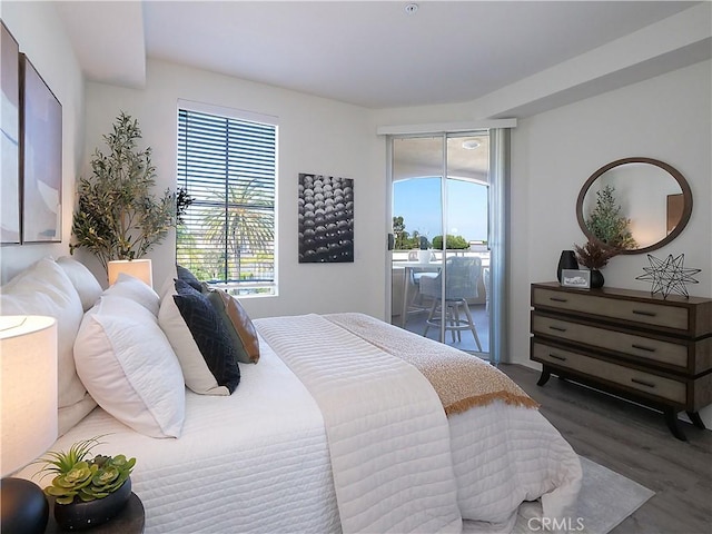 1281 Cabrillo Ave Unit 303, Torrance, CA 90501 - bedroom featuring access to outside, multiple windows, and wood finished floors