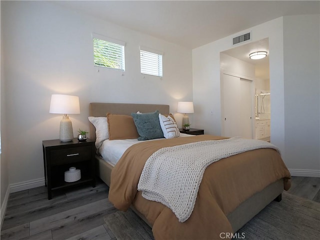 1281 Cabrillo Ave Unit 306, Torrance, CA 90501 - bedroom featuring wood finished floors and ensuite bath