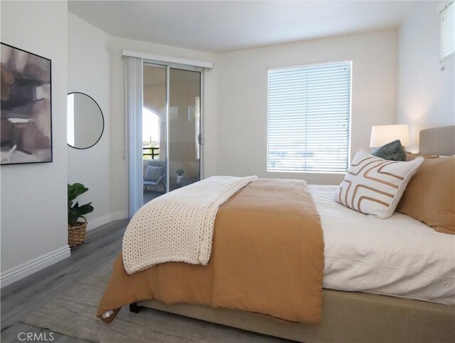 1281 Cabrillo Ave Unit 306, Torrance, CA 90501 - bedroom with wood finished floors and baseboards