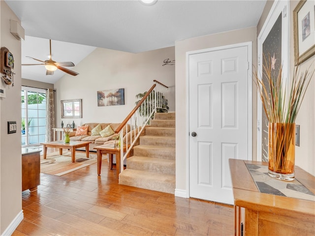2756 Lemon Dr, Simi Valley, CA 93063 - staircase with a ceiling fan, wood finished floors, and vaulted ceiling