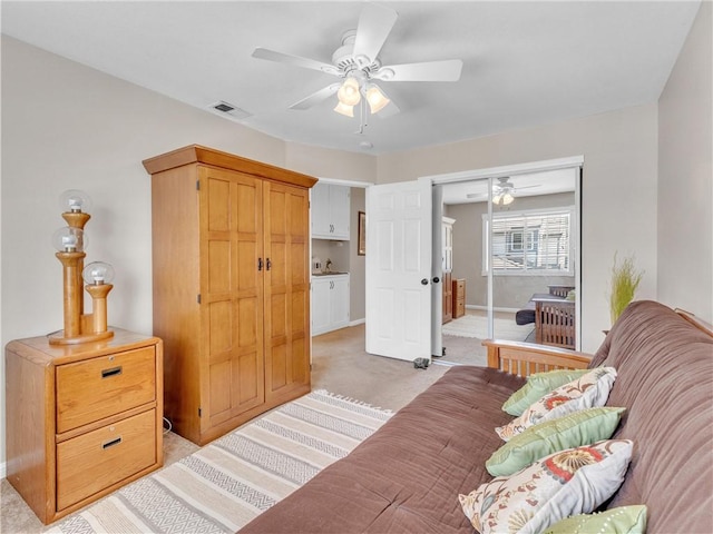 2756 Lemon Dr, Simi Valley, CA 93063 - bedroom with light colored carpet, a closet, and a ceiling fan