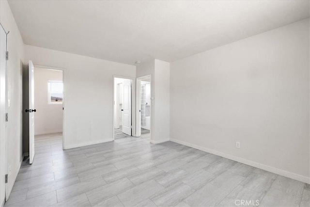 74697 Baseline Rd Unit 29, Palms, CA 92277 - empty room featuring baseboards