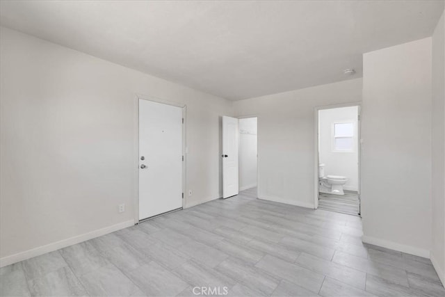 74697 Baseline Rd Unit 29, Palms, CA 92277 - spare room with baseboards and a smoke detector