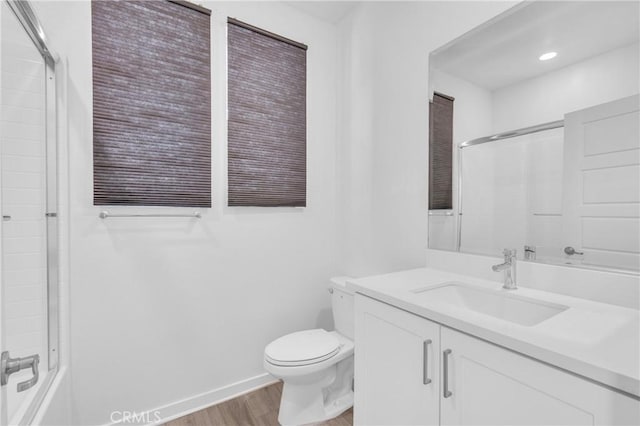 208 Harringay, Irvine, CA 92618 - full bath featuring wood finished floors, vanity, and bath / shower combo with glass door