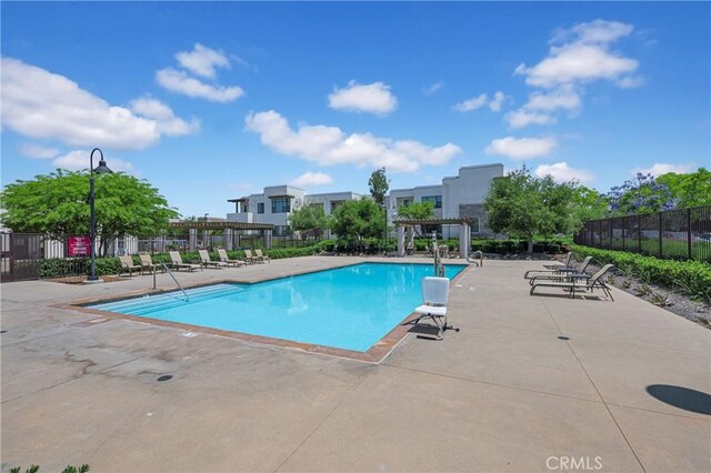 208 Harringay, Irvine, CA 92618 - community pool featuring a pergola and a patio area