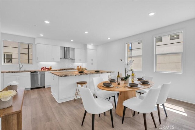 208 Harringay, Irvine, CA 92618 - dining room with light wood-type flooring and recessed lighting