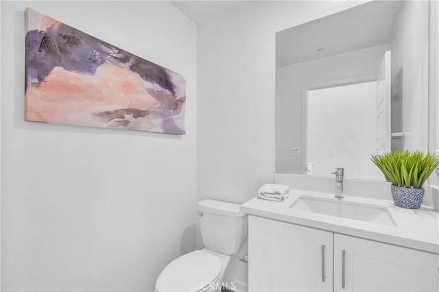 208 Harringay, Irvine, CA 92618 - half bath featuring vanity and toilet