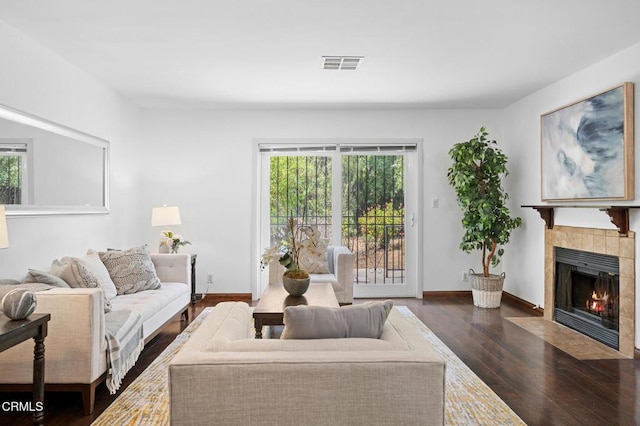 5036 Echo St Unit 37, Los Angeles, CA 90042 - living area featuring dark wood-style floors and a fireplace