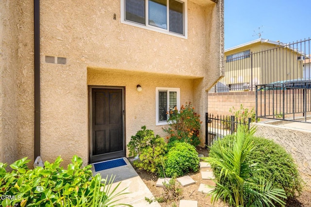 5036 Echo St Unit 37, Los Angeles, CA 90042 - doorway to property featuring stucco siding
