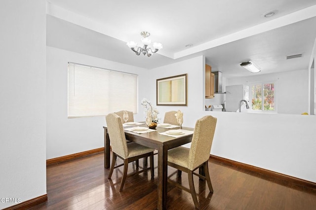 5036 Echo St Unit 37, Los Angeles, CA 90042 - dining space featuring a chandelier and dark wood-type flooring