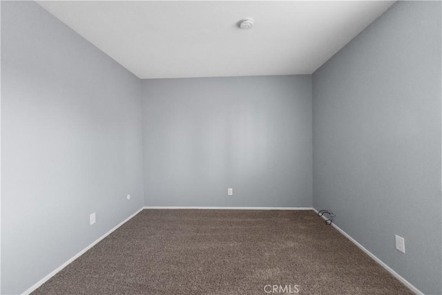 1477 Clemson Way, Riverside, CA 92507 - empty room with carpet flooring and a smoke detector