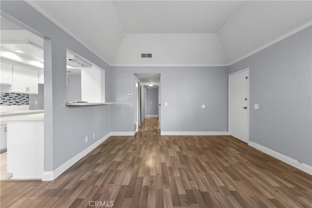 1477 Clemson Way, Riverside, CA 92507 - unfurnished living room with wood finished floors, vaulted ceiling, and ornamental molding