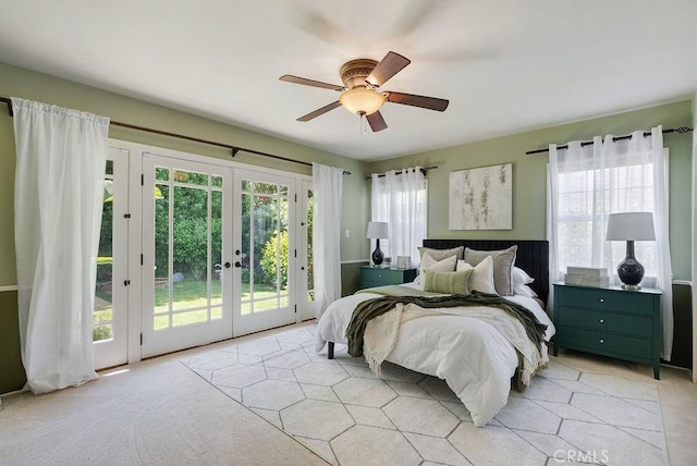 406 University Ave, Burbank, CA 91504 - bedroom with french doors, access to exterior, and a ceiling fan