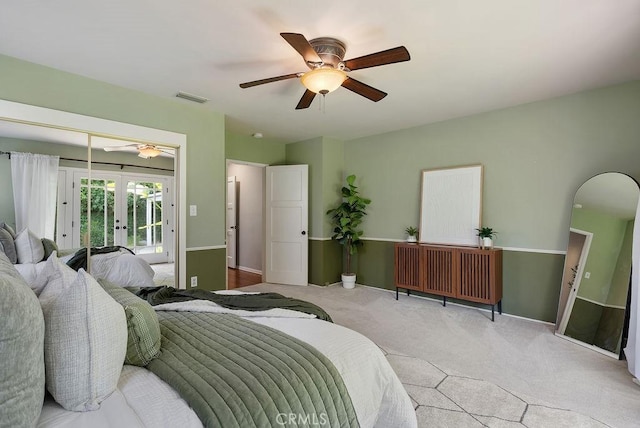 406 University Ave, Burbank, CA 91504 - carpeted bedroom featuring french doors, access to exterior, arched walkways, and a ceiling fan
