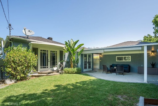 406 University Ave, Burbank, CA 91504 - rear view of property with french doors, a yard, stucco siding, and a patio area