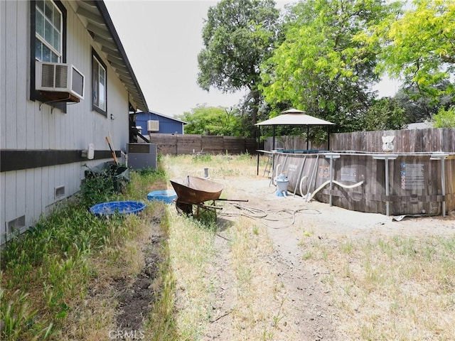 3687 Madison Dr, Clearlake, CA 95422 - fenced backyard featuring cooling unit