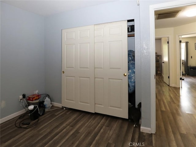 3687 Madison Dr, Clearlake, CA 95422 - unfurnished bedroom with dark wood-type flooring and a closet