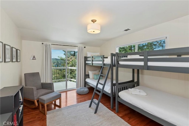 394 Emerald Dr, Lake Arrowhead, CA 92352 - bedroom featuring wood finished floors, access to outside, and multiple windows