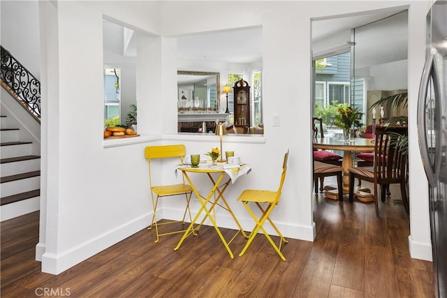 273 Haverfield Unit 156, Newport Beach, CA 92660 - dining space featuring stairs and wood finished floors