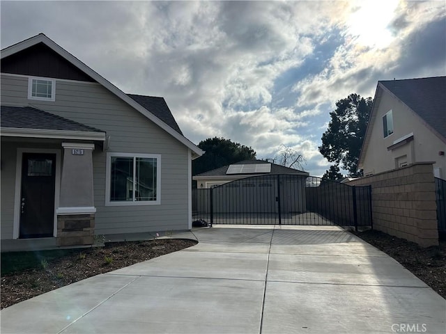 5215 Peony Ct, Riverside, CA 92506 - view of patio featuring a gate and driveway