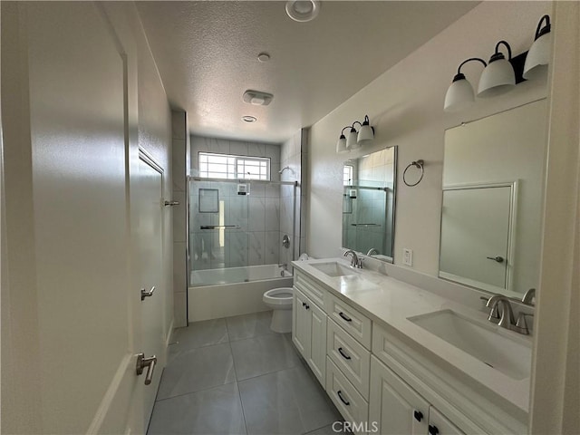 5215 Peony Ct, Riverside, CA 92506 - full bathroom with double vanity, tile patterned flooring, bathing tub / shower combination, and a textured ceiling
