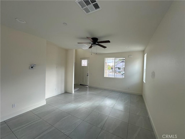 5215 Peony Ct, Riverside, CA 92506 - tiled empty room with ceiling fan and baseboards