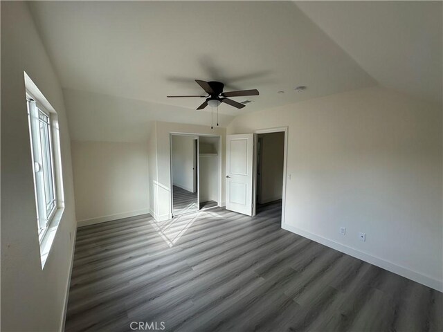 5215 Peony Ct, Riverside, CA 92506 - unfurnished bedroom with wood finished floors, a closet, and a ceiling fan