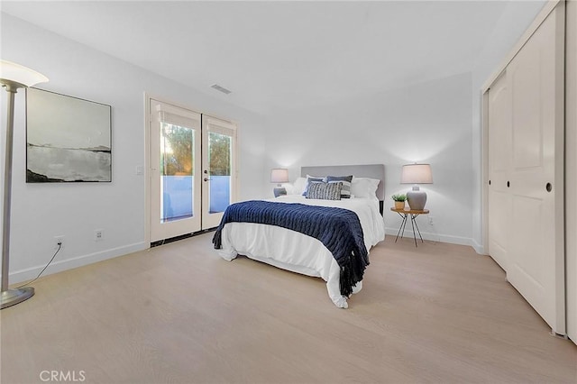 1749 Grand Ave Unit 4, Long Beach, CA 90804 - bedroom with access to exterior, light wood-style floors, and french doors