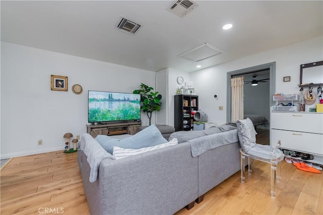 1068 Richmond Dr, Claremont, CA 91711 - living room featuring light wood-type flooring and recessed lighting