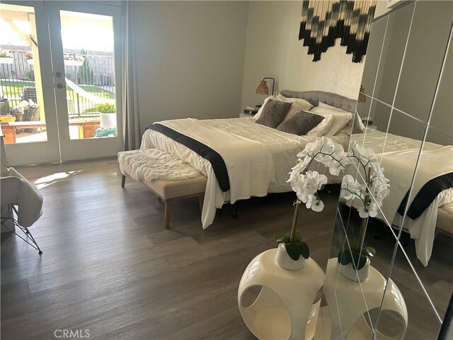 2258 El Rio St, Lancaster, CA 93535 - bedroom with wood finished floors, access to exterior, and french doors