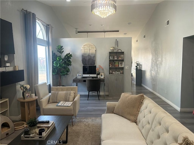 2258 El Rio St, Lancaster, CA 93535 - living room with wood finished floors, a chandelier, and vaulted ceiling