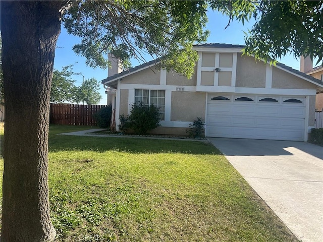2258 El Rio St, Lancaster, CA 93535 - view of front facade featuring stucco siding, concrete driveway, a chimney, and a garage