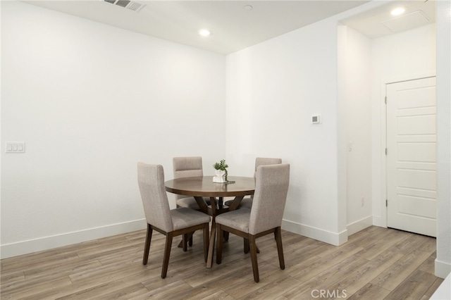 480 W Balsam Ln, Clovis, CA 93611 - dining room with light wood-style floors and recessed lighting