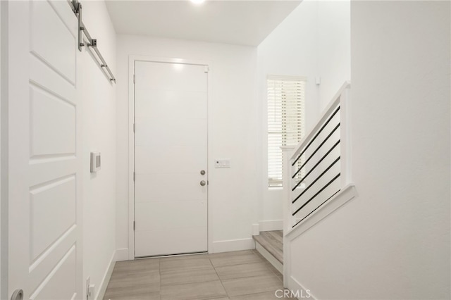 480 W Balsam Ln, Clovis, CA 93611 - entrance foyer with stairway and a barn door