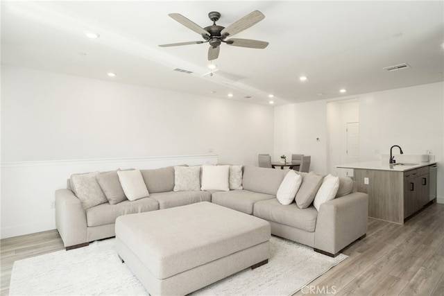 480 W Balsam Ln, Clovis, CA 93611 - living area featuring recessed lighting, light wood-style floors, and a ceiling fan
