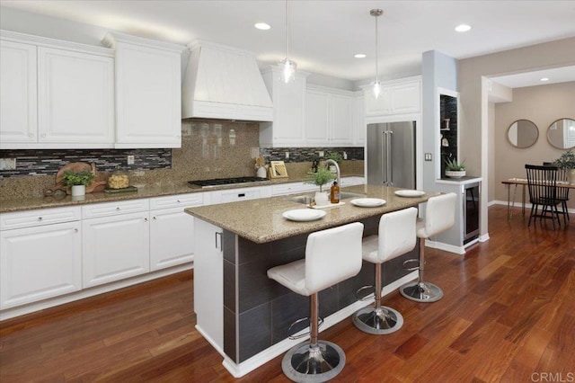 15809 Concord Rdg, San Diego, CA 92127 - kitchen featuring premium range hood, appliances with stainless steel finishes, decorative backsplash, white cabinetry, and recessed lighting