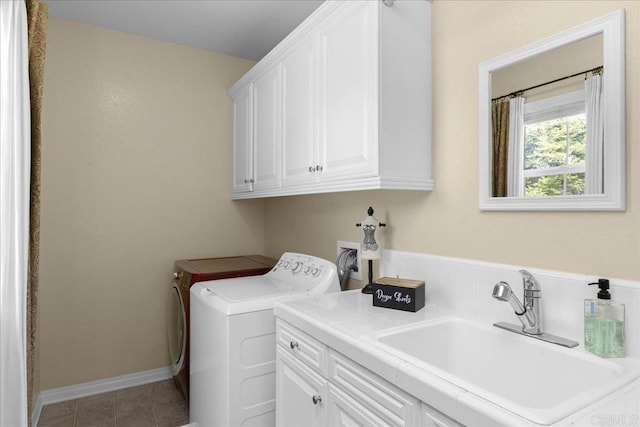 15809 Concord Rdg, San Diego, CA 92127 - washroom featuring cabinet space, washer and clothes dryer, and tile patterned flooring