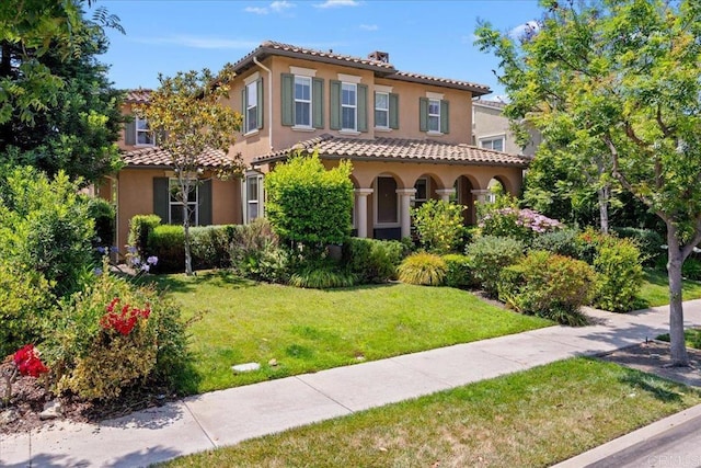 15809 Concord Rdg, San Diego, CA 92127 - mediterranean / spanish-style house featuring stucco siding, a tiled roof, and a front yard