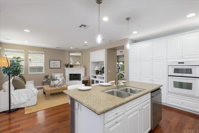 15809 Concord Rdg, San Diego, CA 92127 - kitchen featuring double oven, dishwasher, open floor plan, dark wood-type flooring, and white cabinets