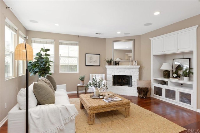 15809 Concord Rdg, San Diego, CA 92127 - living room featuring dark wood-style floors, a fireplace, and recessed lighting