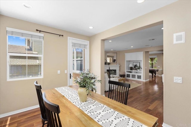 15809 Concord Rdg, San Diego, CA 92127 - dining room with dark wood-type flooring, plenty of natural light, recessed lighting, and a fireplace