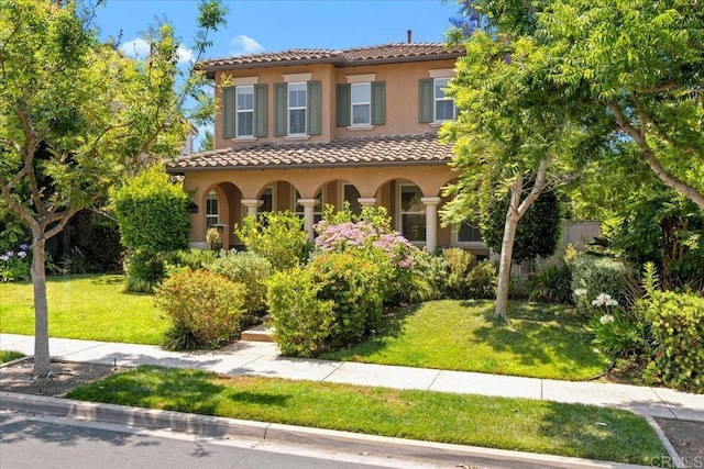 15809 Concord Rdg, San Diego, CA 92127 - mediterranean / spanish home featuring stucco siding, a tiled roof, and a front lawn
