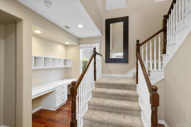 15809 Concord Rdg, San Diego, CA 92127 - stairway with built in study area, wood finished floors, and recessed lighting