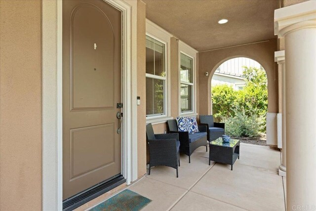 15809 Concord Rdg, San Diego, CA 92127 - view of exterior entry with stucco siding and covered porch