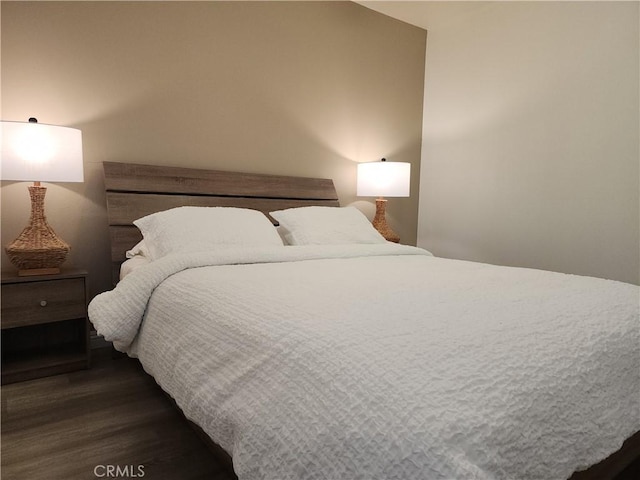 1150 W Santa Clara Ave, Santa Ana, CA 92706 - bedroom with dark wood-style floors