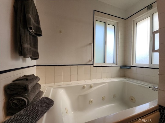 1150 W Santa Clara Ave, Santa Ana, CA 92706 - bathroom featuring plenty of natural light and a jetted tub
